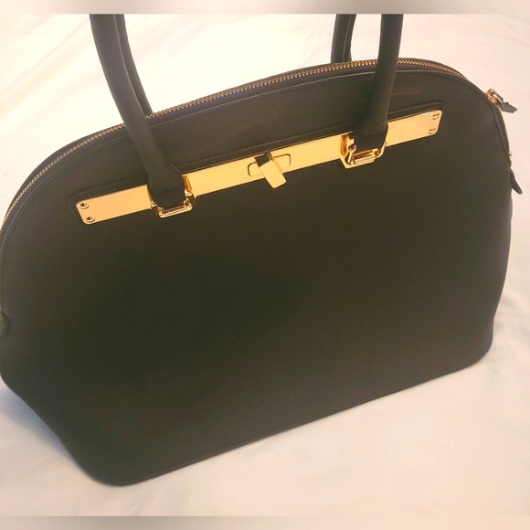 Aldo brand hand bag, medium size. Black with gold accents. - Picture 2 of 2
